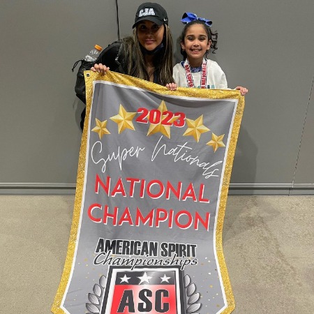 Giovanna Marie LaValle ist he banner winner of the American Spirit Championship.